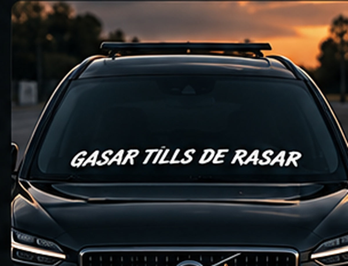 Gasar tills de rasar framrutedekal på mörk bil